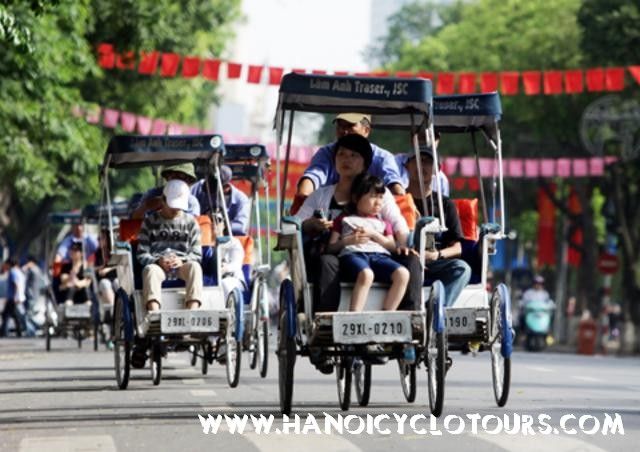 Cyclo procession in Hanoi